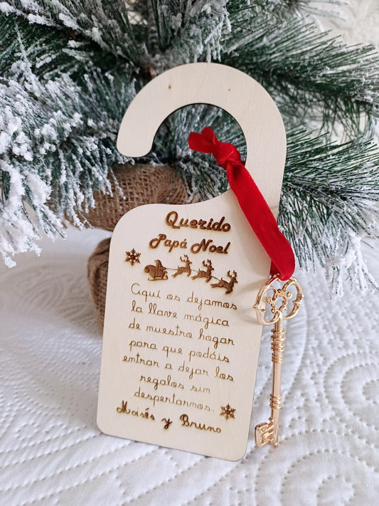 Cuelga puertas con llave mágica Papá Noel